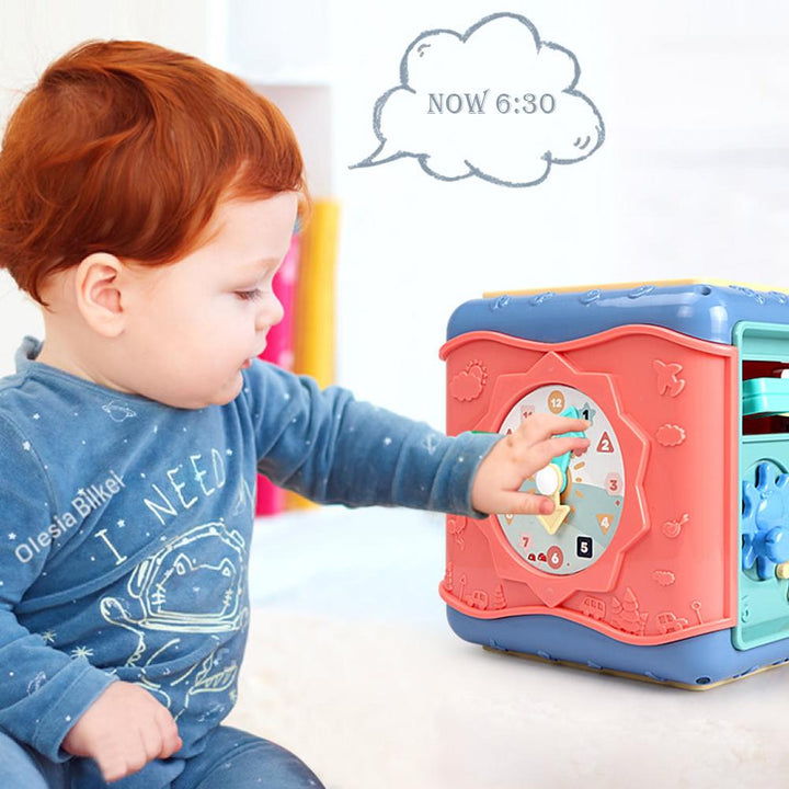 Montessori activity cube for babies. A multi-sensory toy that builds ...